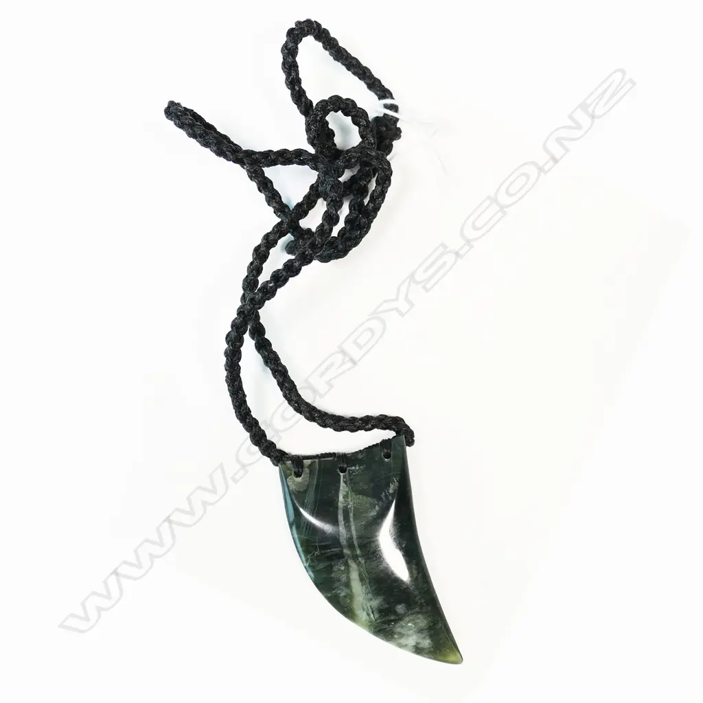 Te Kaha carved pounamu (chatoyant tangiwai) large rei niho (eye tooth) pendant, Image 1++